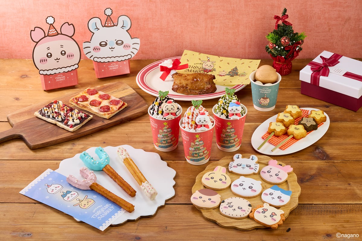 フードの一例。キャラクターの顔を描いたアイシングクッキー、ホイップを乗せたドリンク、チュロス、ピザなどが並ぶ